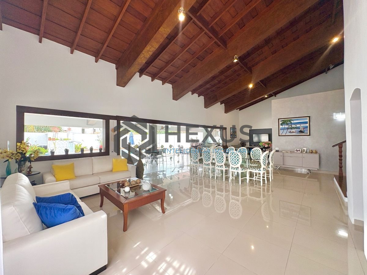 Foto 7 de Casa reformada com piscina e área gourmet no Jardim Acapulco, Guarujá
