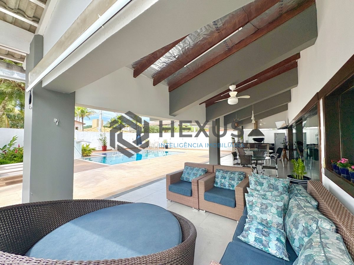 Foto 12 de Casa reformada com piscina e área gourmet no Jardim Acapulco, Guarujá