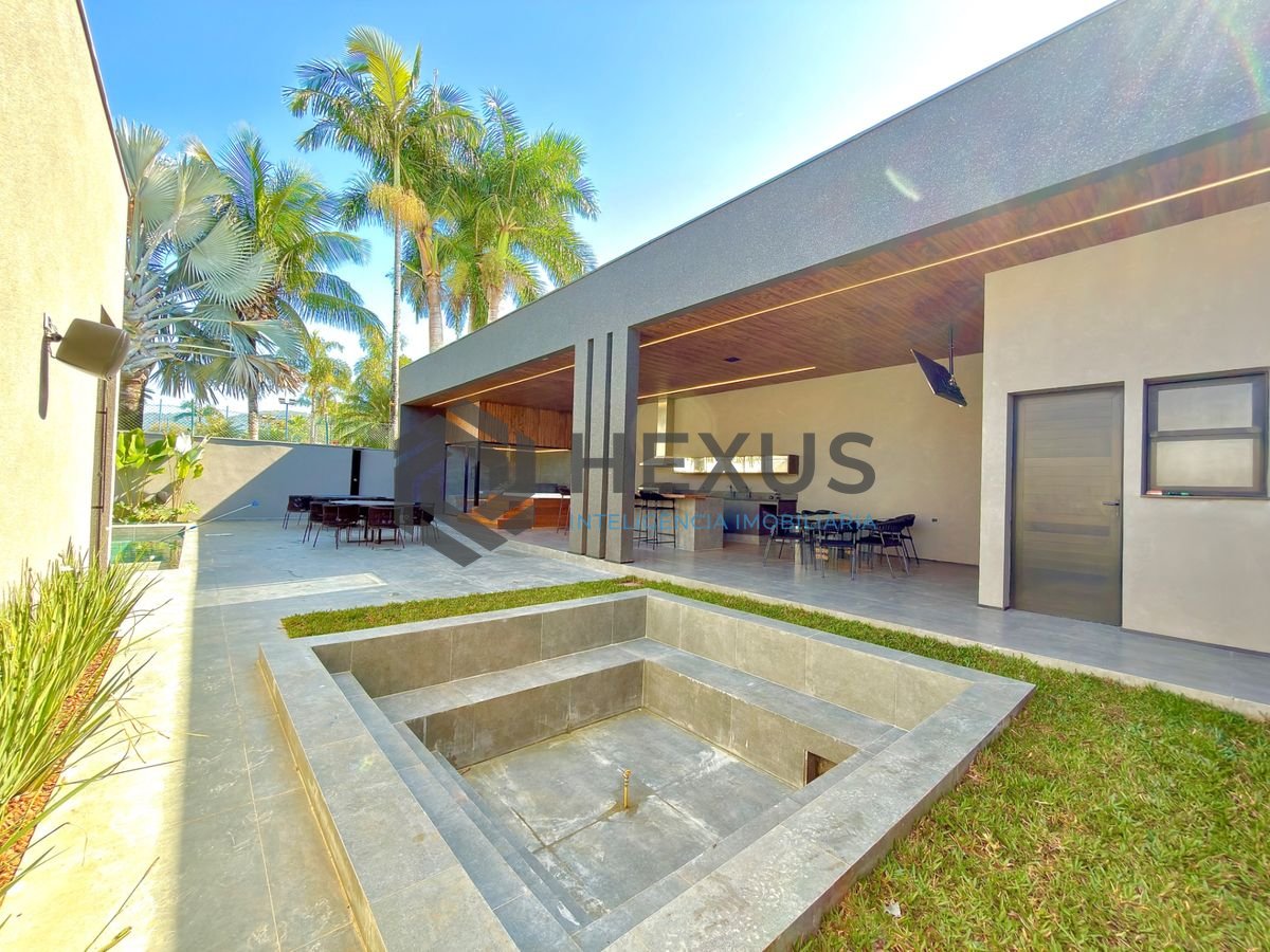 Foto 12 de Casa de alto padrão com piscina e área gourmet no Jardim Acapulco, Guarujá