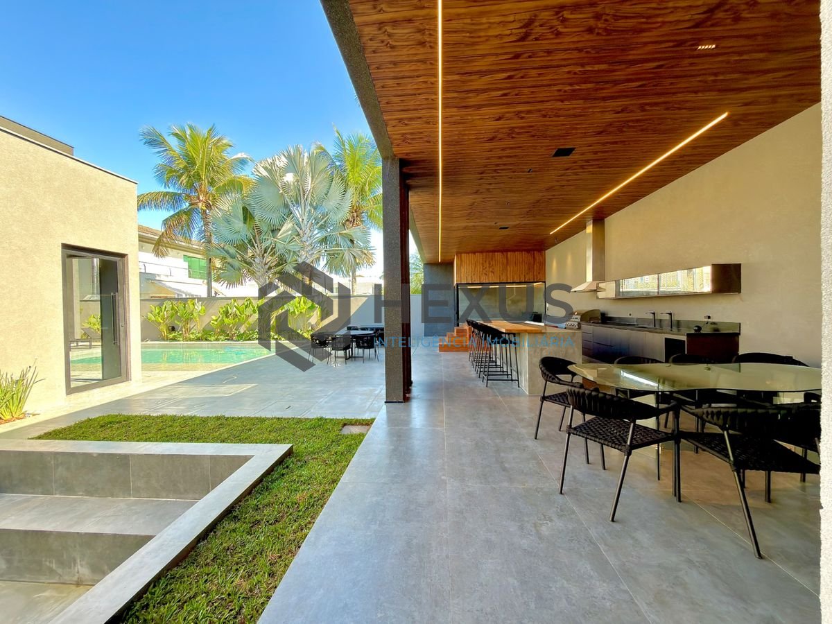 Foto 4 de Casa de alto padrão com piscina e área gourmet no Jardim Acapulco, Guarujá