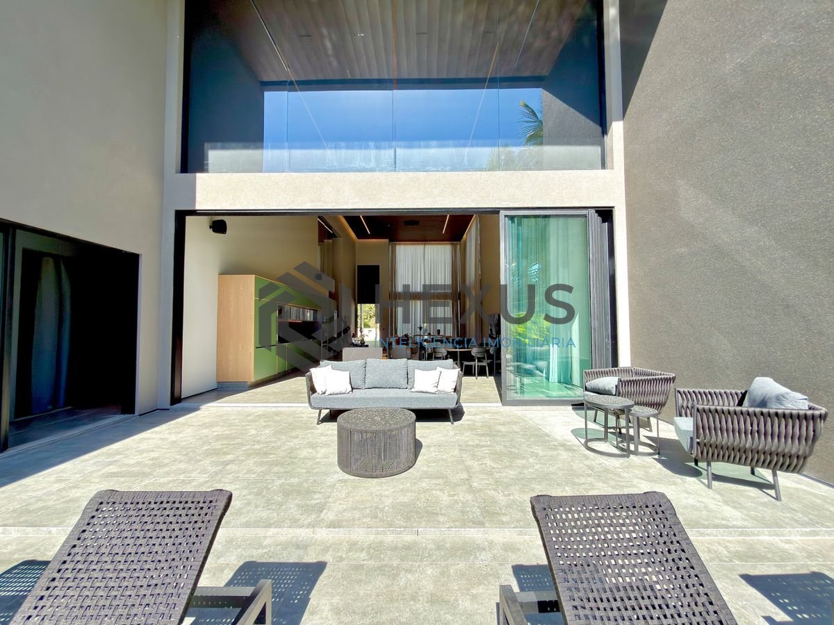 Foto 10 de Casa de alto padrão com piscina e área gourmet no Jardim Acapulco, Guarujá
