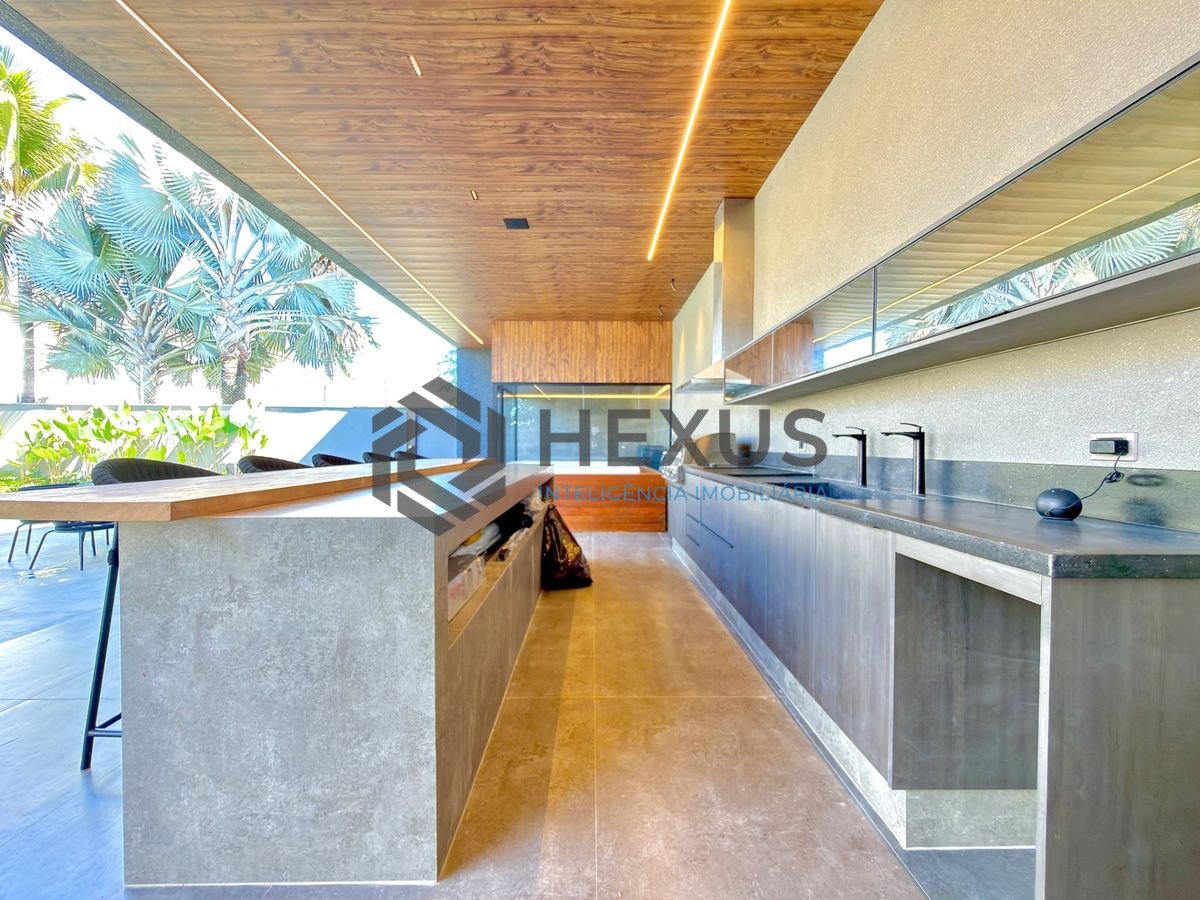 Foto 11 de Casa de alto padrão com piscina e área gourmet no Jardim Acapulco, Guarujá