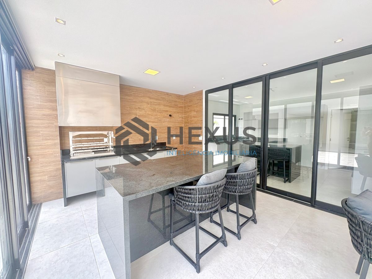 Foto 12 de Casa reformada com piscina e área gourmet no Jardim Acapulco, Guarujá