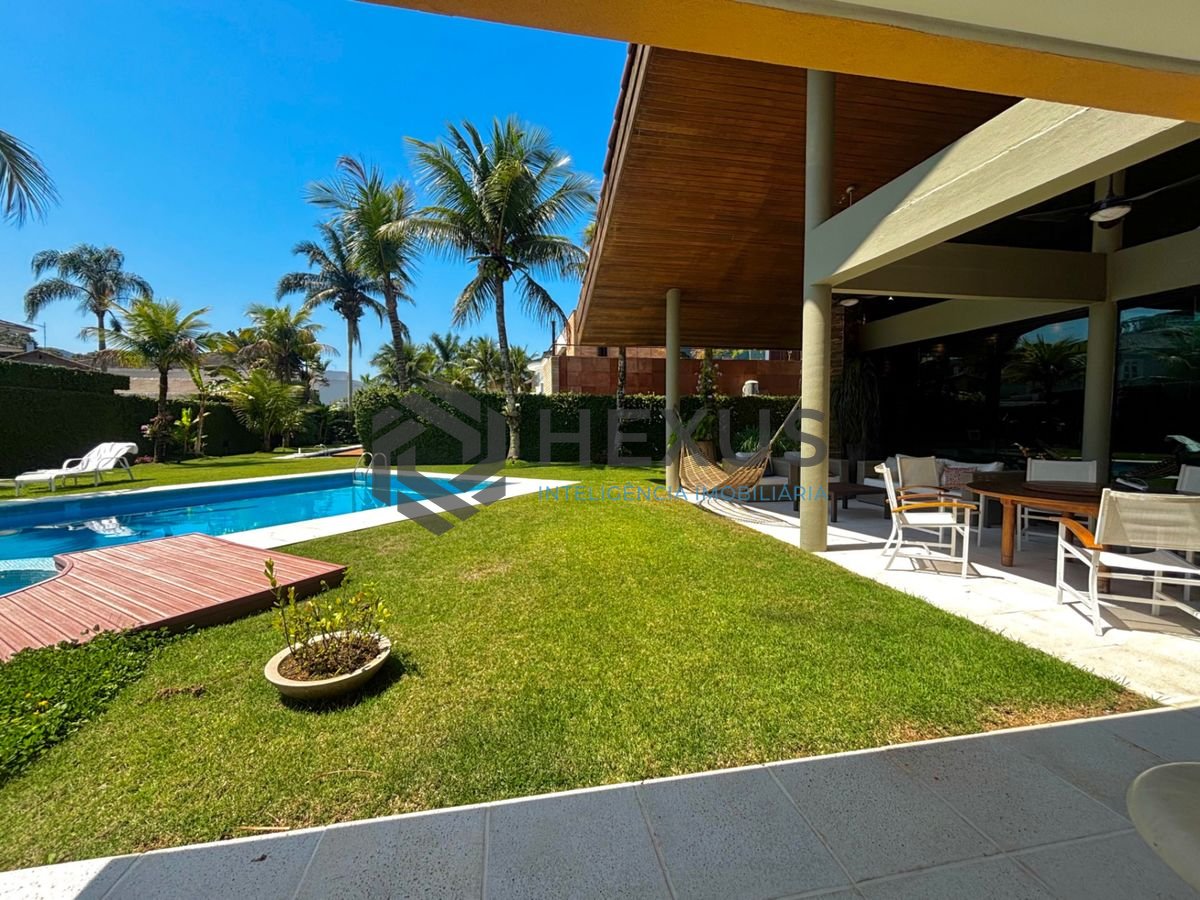 Foto 18 de Casa reformada com piscina e área gourmet no Jardim Acapulco, Guarujá