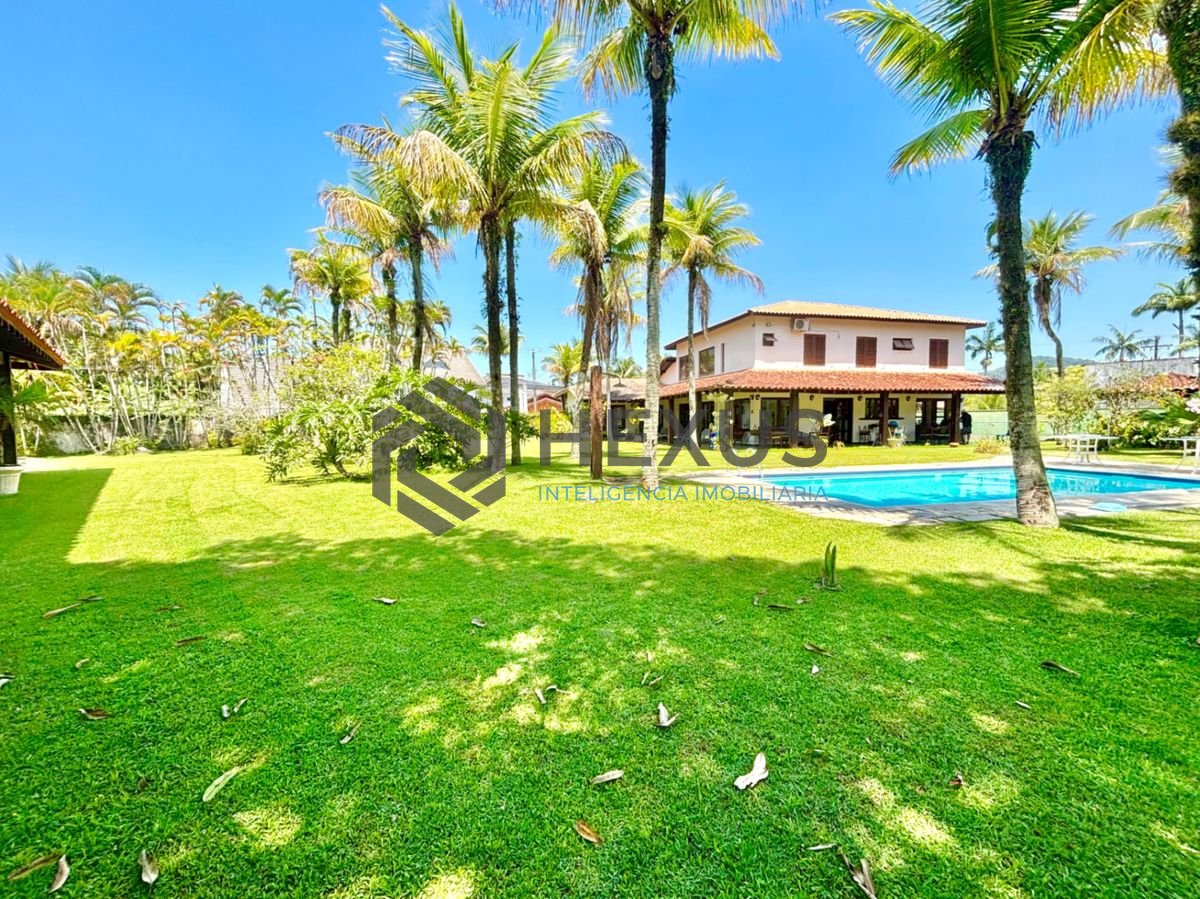 Foto 10 de Casa reformada com piscina e área gourmet no Jardim Acapulco, Guarujá
