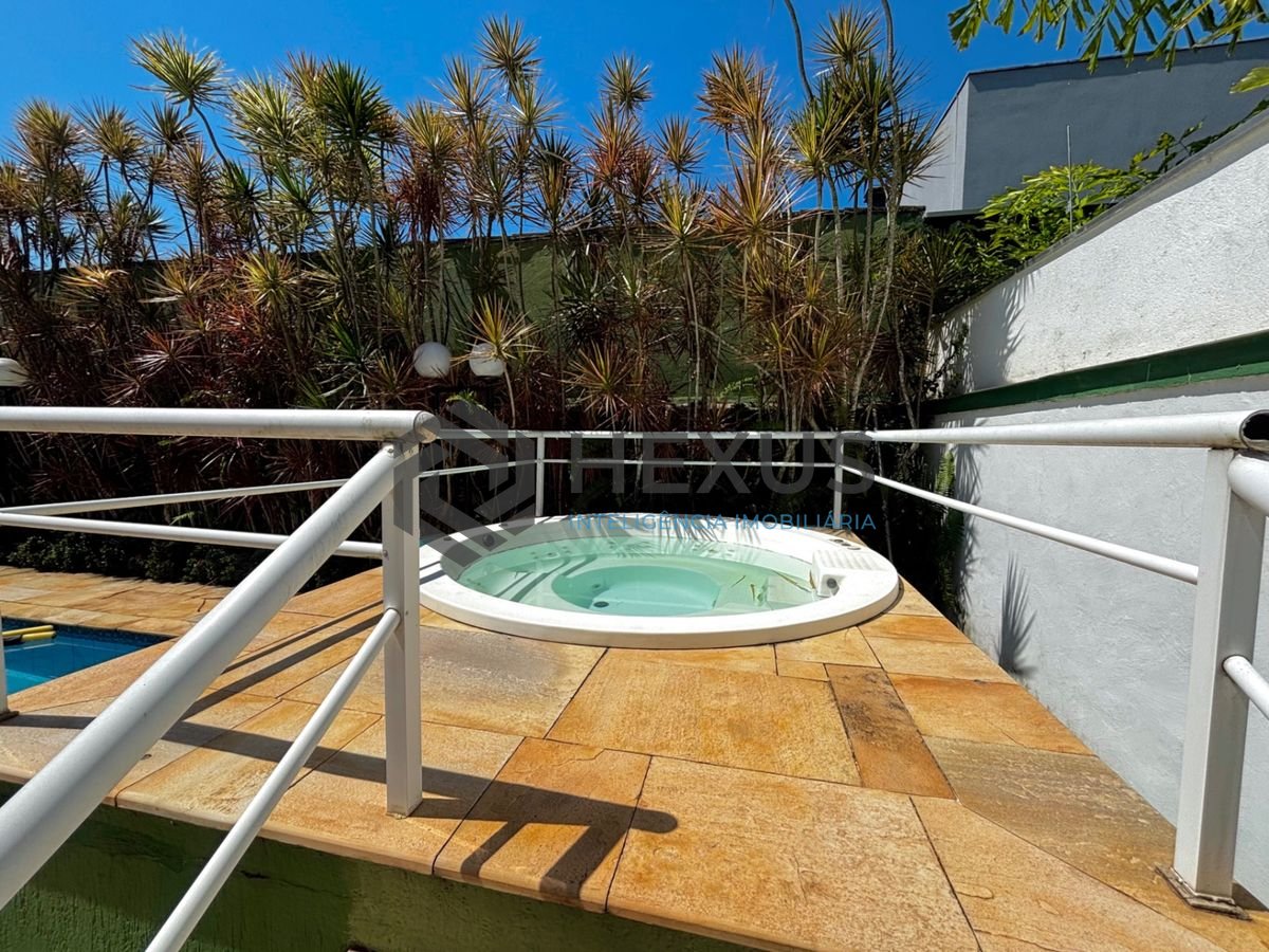 Foto 11 de Casa reformada com piscina e área gourmet no Jardim Acapulco, Guarujá