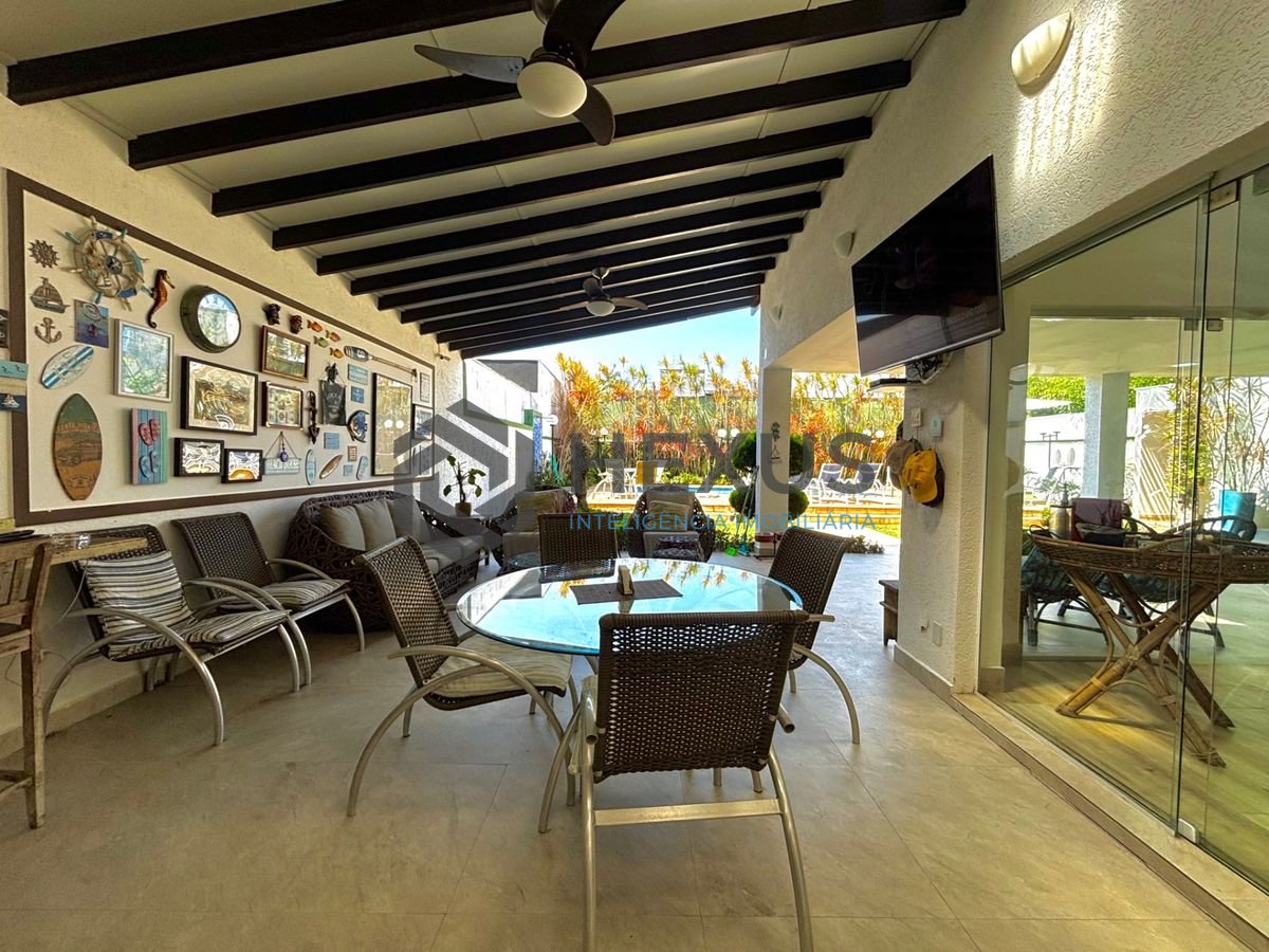 Foto 35 de Casa reformada com piscina e área gourmet no Jardim Acapulco, Guarujá