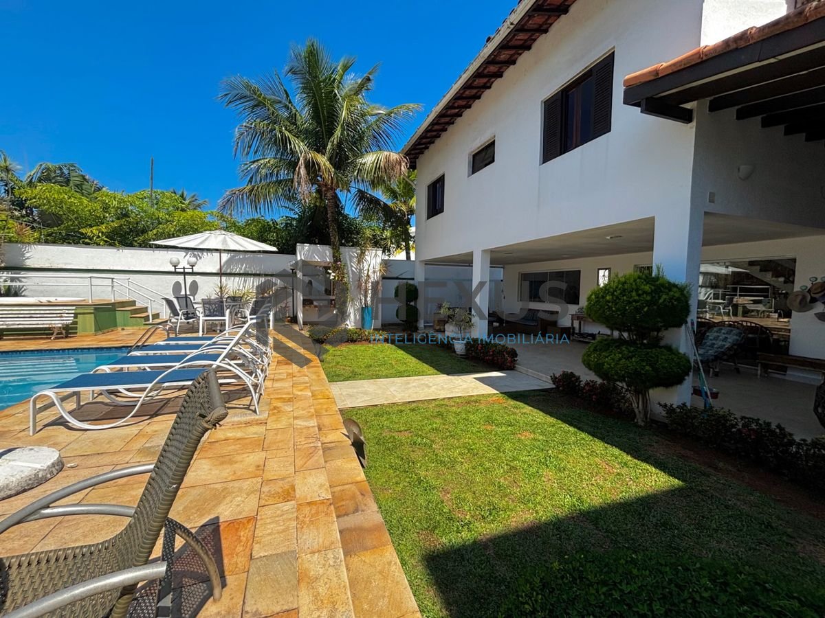 Foto 7 de Casa reformada com piscina e área gourmet no Jardim Acapulco, Guarujá