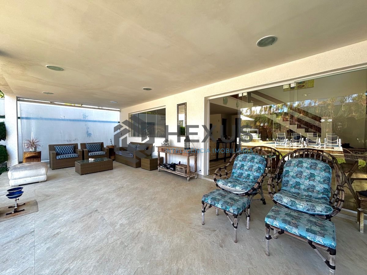 Foto 16 de Casa reformada com piscina e área gourmet no Jardim Acapulco, Guarujá
