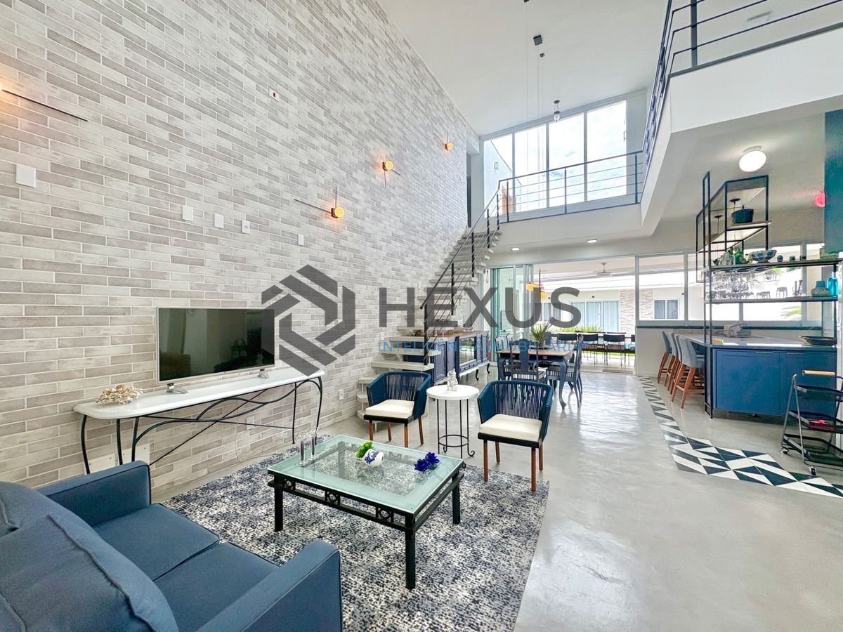 Foto 7 de Casa reformada com piscina e área gourmet no Jardim Acapulco, Guarujá