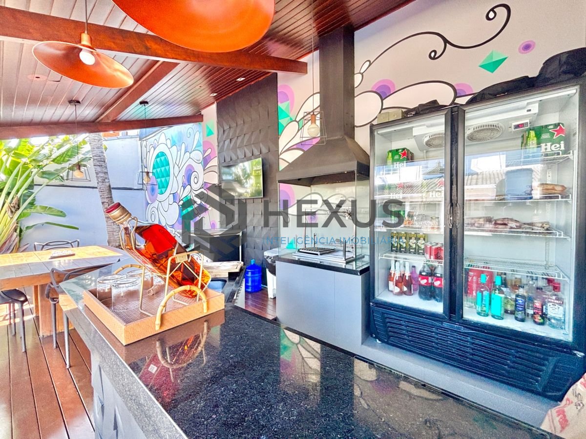 Foto 11 de Casa reformada com piscina e área gourmet no Jardim Acapulco, Guarujá