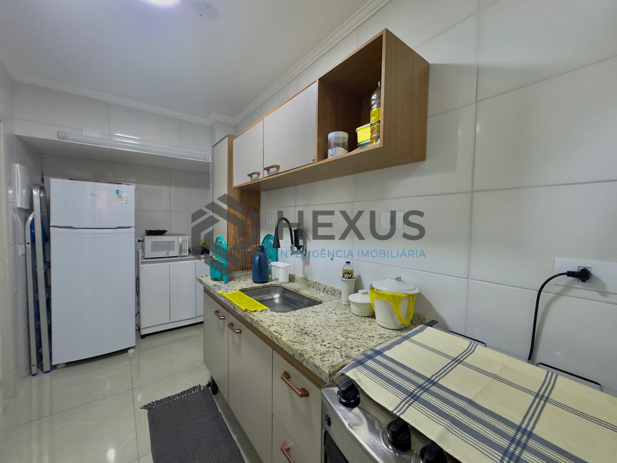 Foto 12 de Apartamento reformado Praia das Pitangueiras à venda, Guarujá-SP.