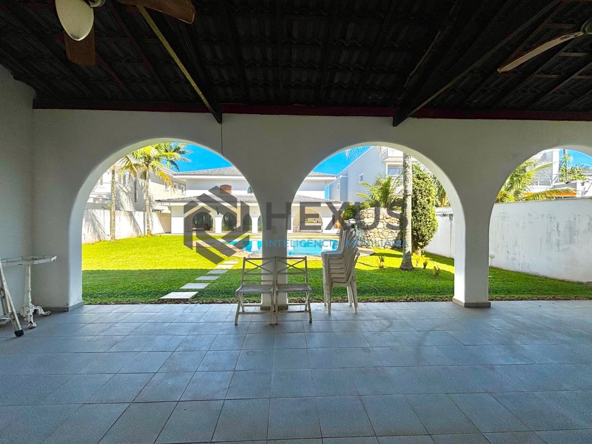 Foto 12 de Casa reformada com piscina e área gourmet no Jardim Acapulco, Guarujá