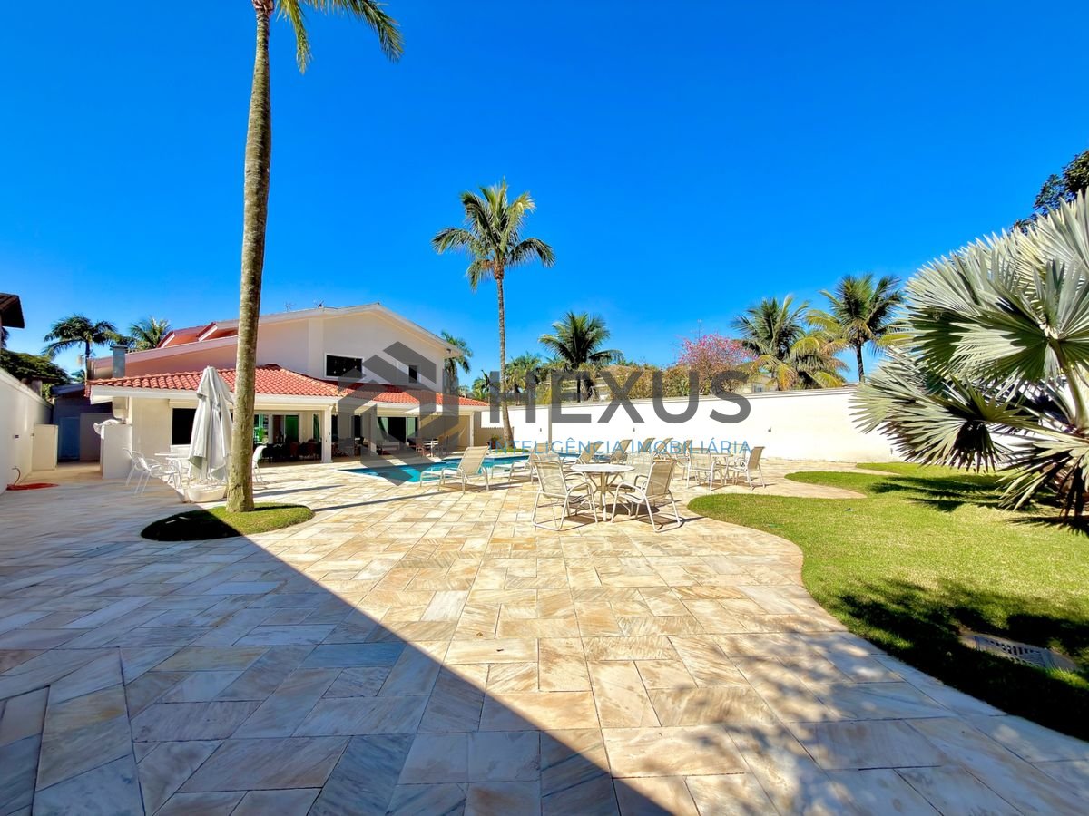 Foto 14 de Casa de alto padrão com varanda piscina e área gourmet no Jardim Acapulco, Guarujá