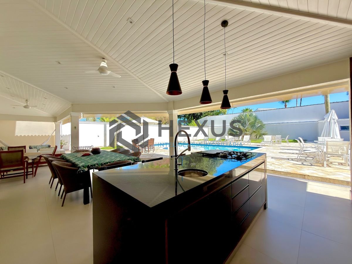 Foto 9 de Casa de alto padrão com varanda piscina e área gourmet no Jardim Acapulco, Guarujá