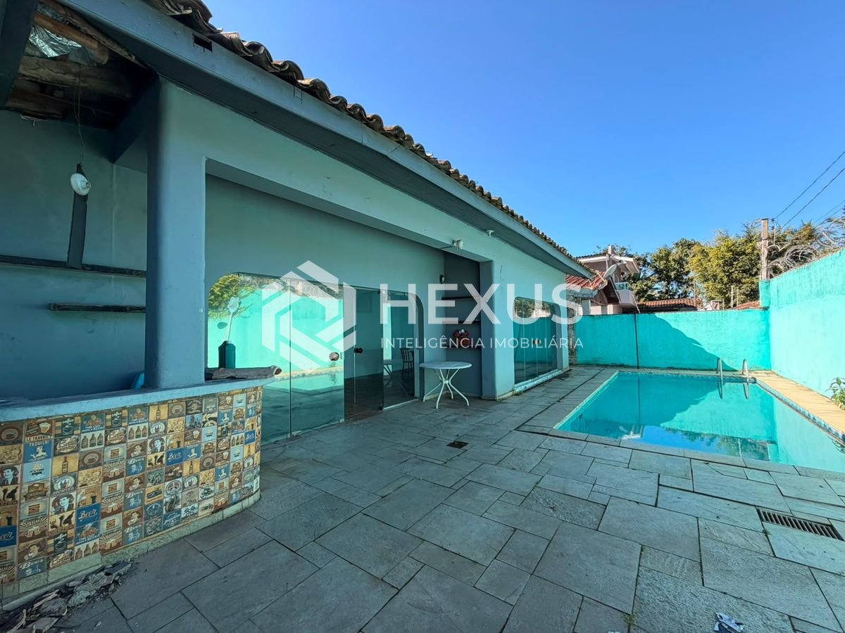 Foto 2 de Casa com varanda piscina e área gourmet em Jardim Virgínia, Guarujá