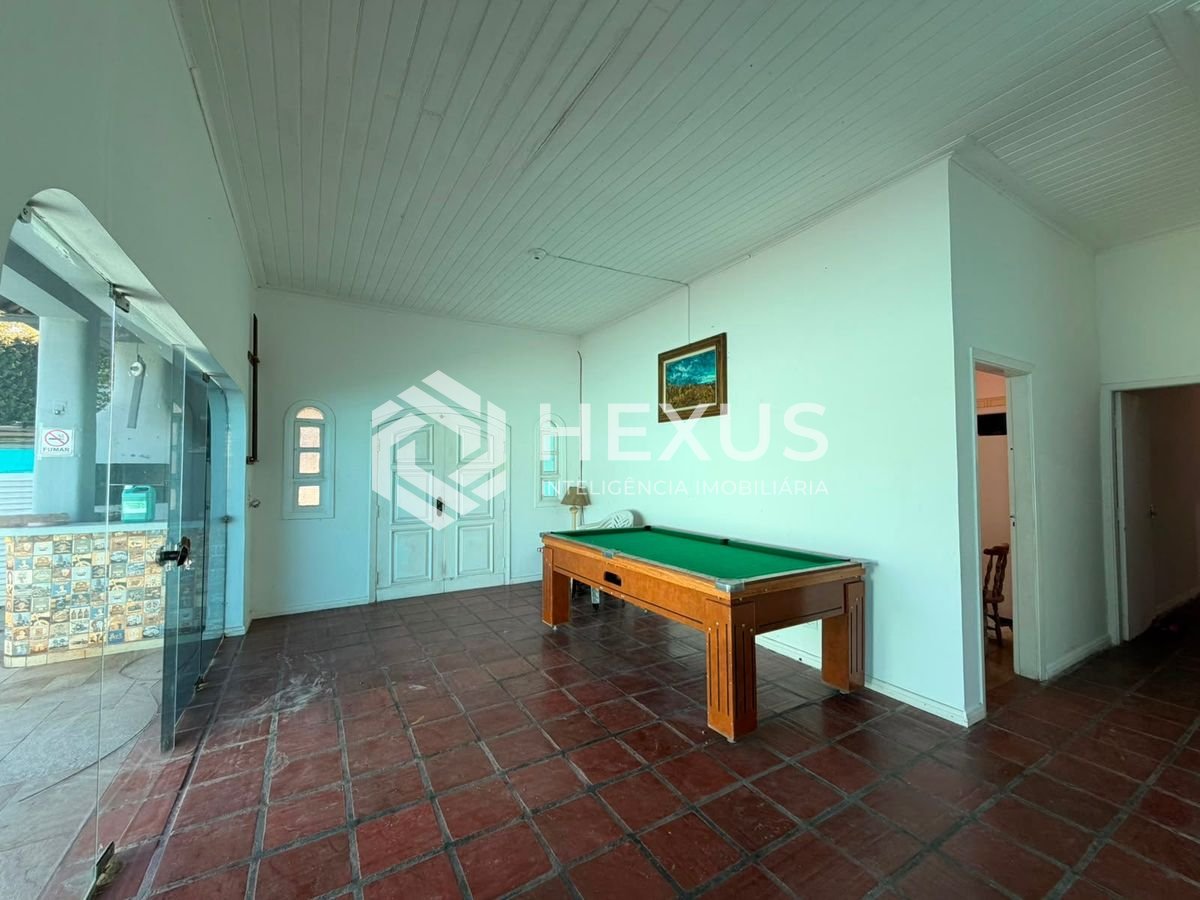 Foto 4 de Casa com varanda piscina e área gourmet em Jardim Virgínia, Guarujá